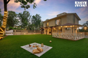 Elegant Escapes with Swimming Pool, Lawn & Bonfire at Panchgani by StayVista